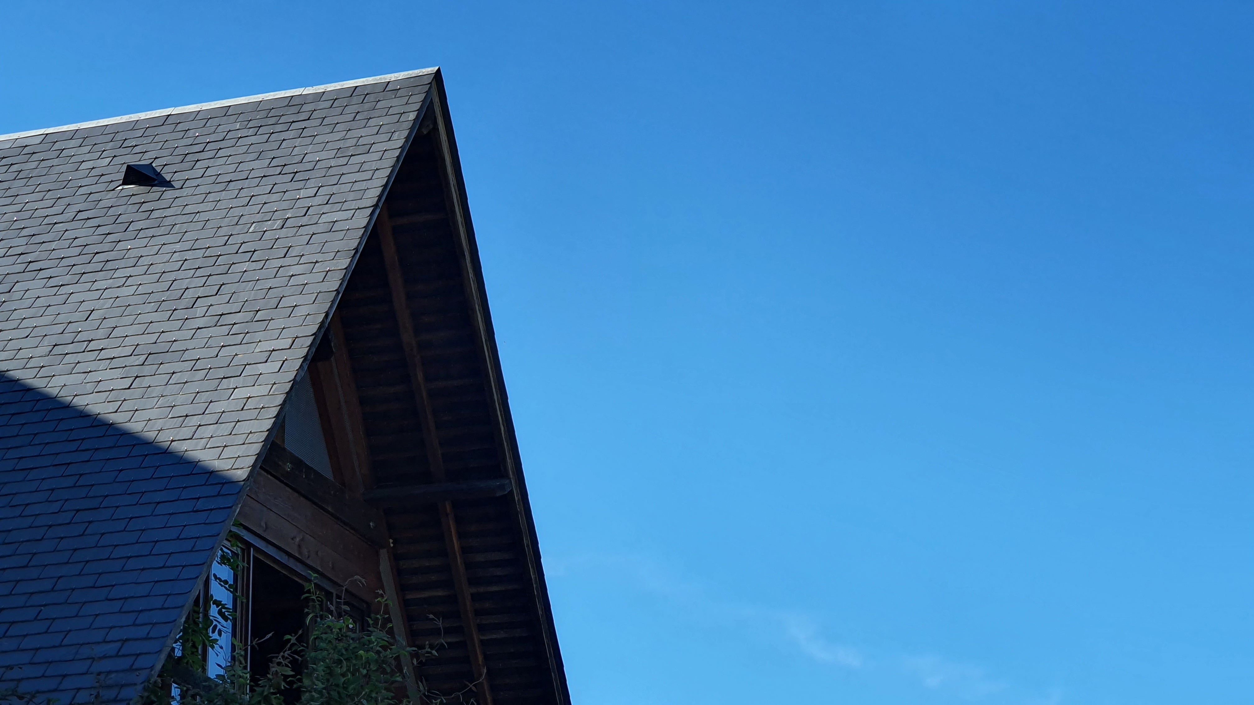 Traditional UK house with a newly installed tiled pitched roof